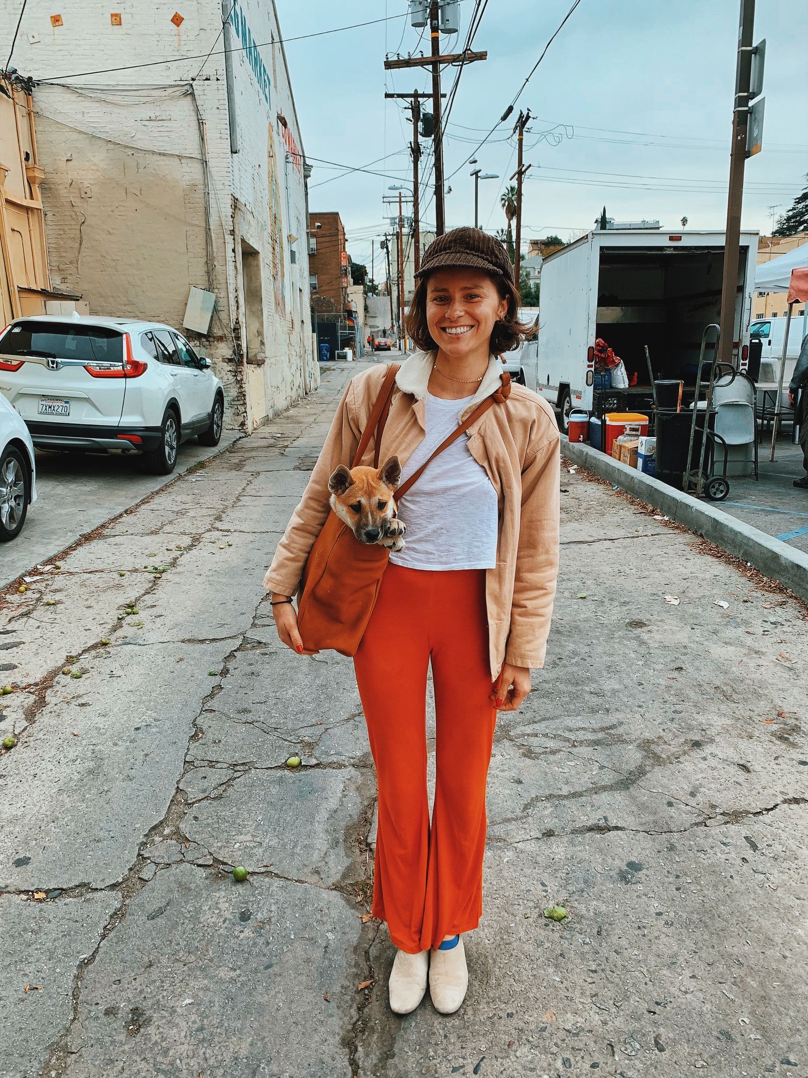 Image may contain Person Standing Clothing Pants and Adult